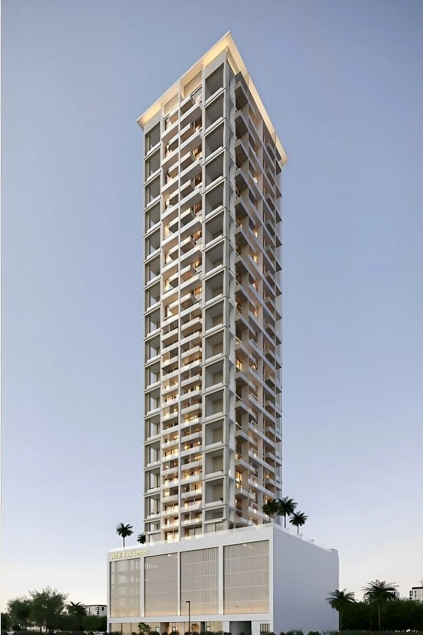 Alfal Tower by day, the linear channels reading as thin shadow lines against the pale facade